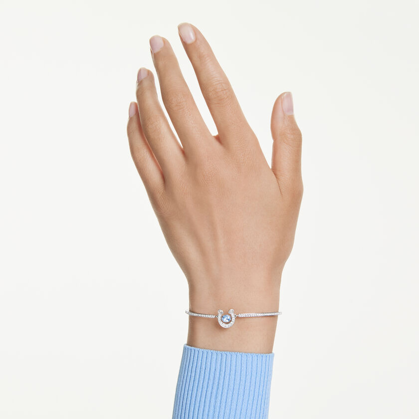 swarovski سوار symbolica، قطع مستدير، أحجار كريستال صغيرة متراصة، شكل حدوة حصان، لون أزرق، طلاء روديوم