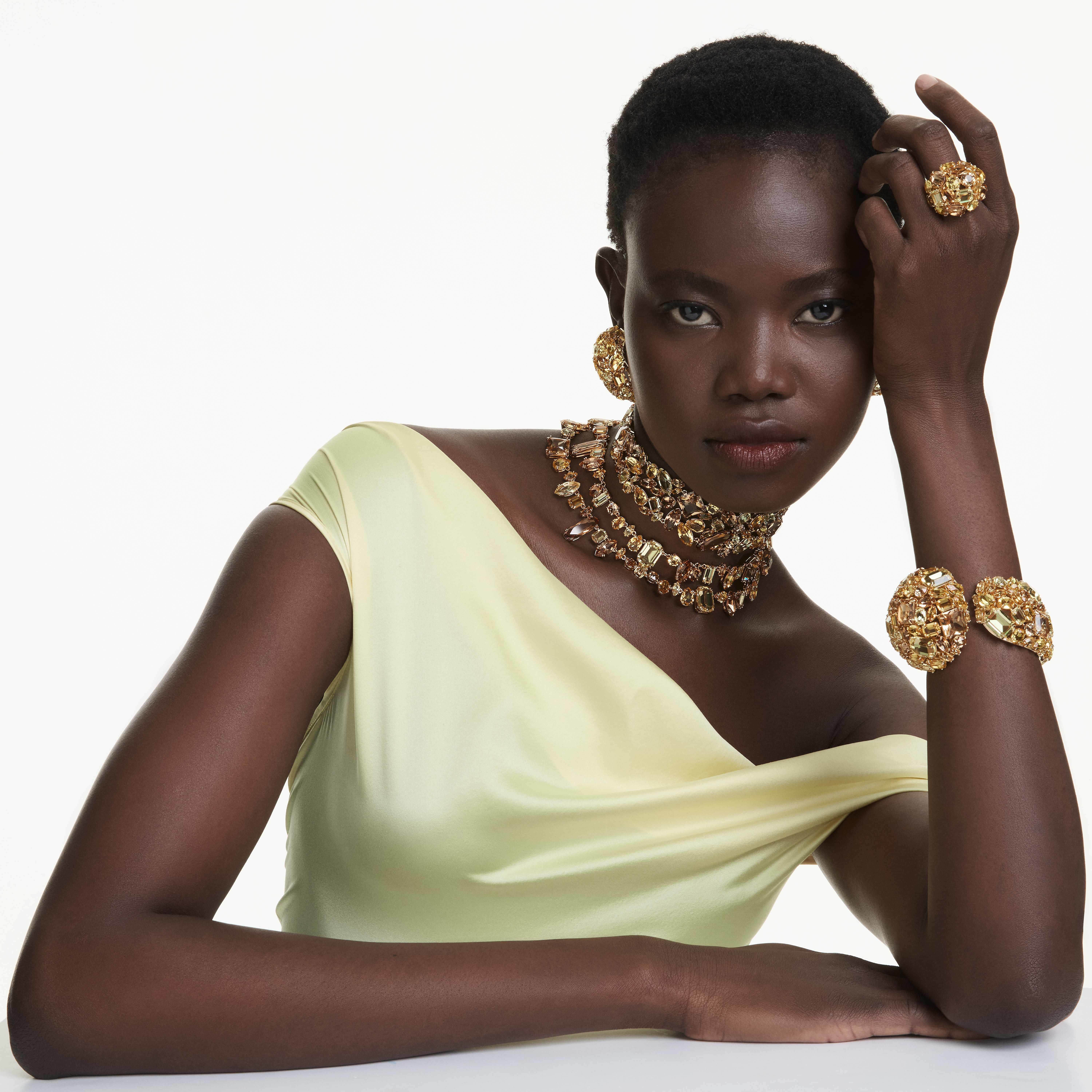 swarovski سوار gema، لون أصفر، طلاء باللون الذهبي