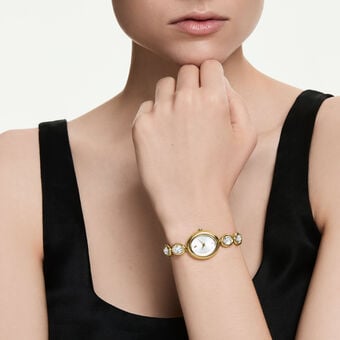 swarovski ساعة بيضاوية imber، صناعة سويسرية، سوار معدني، لون ذهبي، لمسة نهائية بلون ذهبي