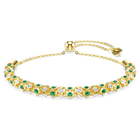 swarovski dextera bracelet  round cut  green  gold tone finish