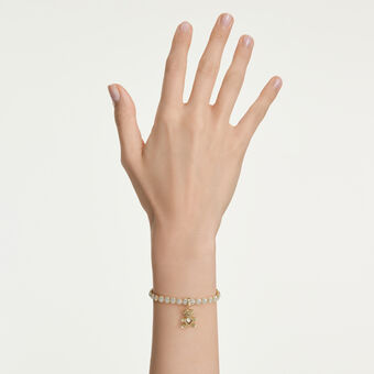 swarovski حلية idyllia، قطع متنوع، شكل دب، لون ذهبي، طلاء باللون الذهبي